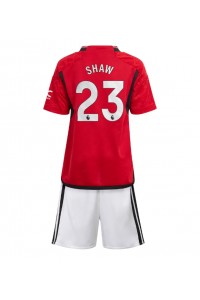 Fotbalové Dres Manchester United Luke Shaw #23 Dětské Domácí Oblečení 2023-24 Krátký Rukáv (+ trenýrky)